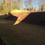 Pressure Treated Pine Wood Privacy Fence Up A Slope in Dallas, GA Lawn Frogs Landscaping