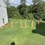 Setting Fence Post with Gate in Seven Hills Subdivision Dallas, GA Lawn Frogs Landscaping