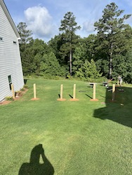 Setting Fence Post with Gate in Seven Hills Subdivision Dallas, GA Lawn Frogs Landscaping